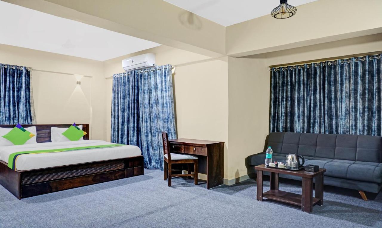 Treebo Tulip Hotel ปูเน่ ภายนอก รูปภาพ