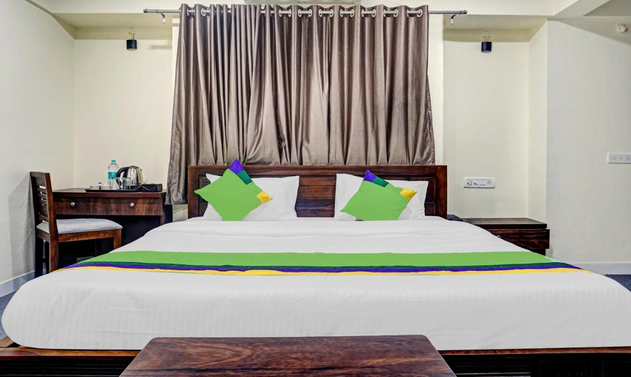 Treebo Tulip Hotel ปูเน่ ภายนอก รูปภาพ