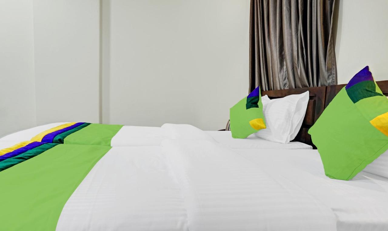 Treebo Tulip Hotel ปูเน่ ภายนอก รูปภาพ