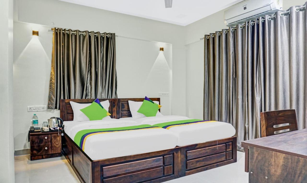 Treebo Tulip Hotel ปูเน่ ภายนอก รูปภาพ