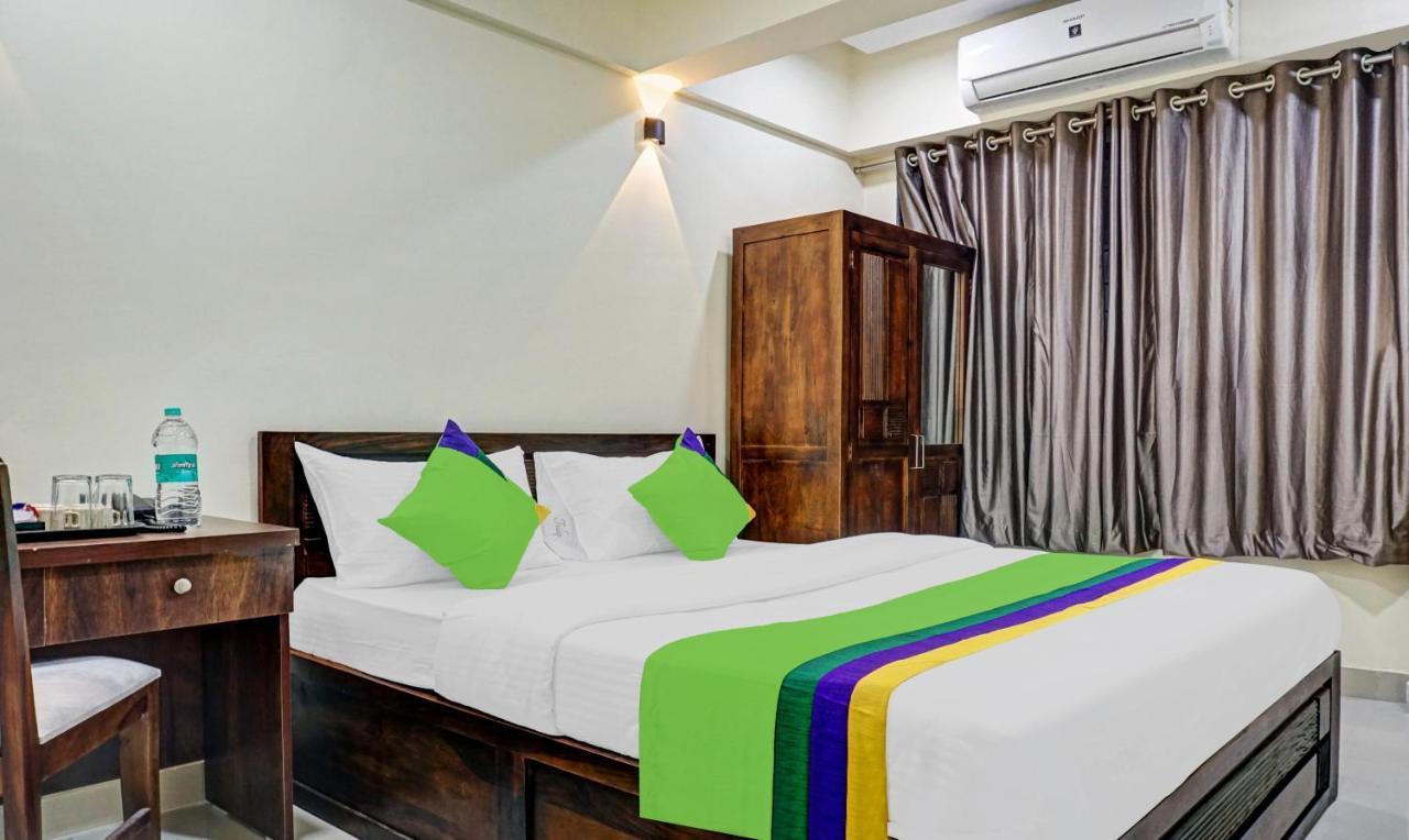 Treebo Tulip Hotel ปูเน่ ภายนอก รูปภาพ