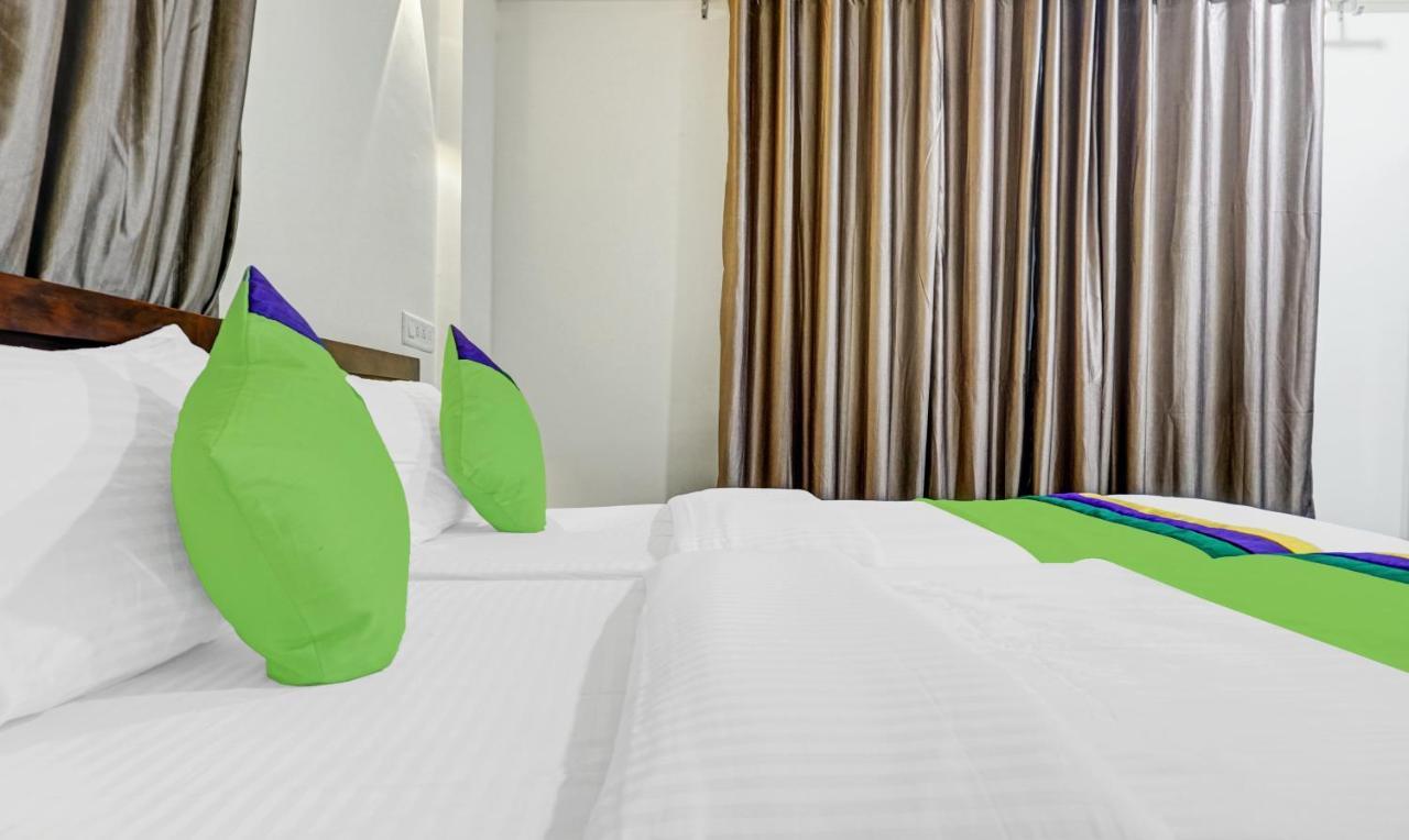 Treebo Tulip Hotel ปูเน่ ภายนอก รูปภาพ